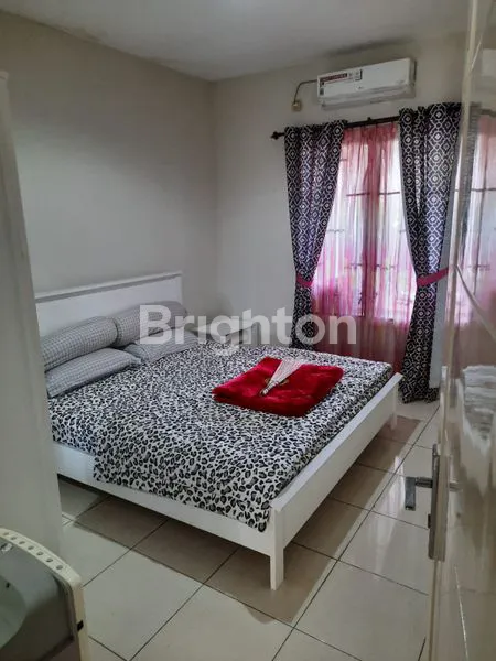 image RUMAH DENGAN TAMAN TERBUKA DI PURIMAS SURABAYA DEKAT UPN DAN MERR (6)