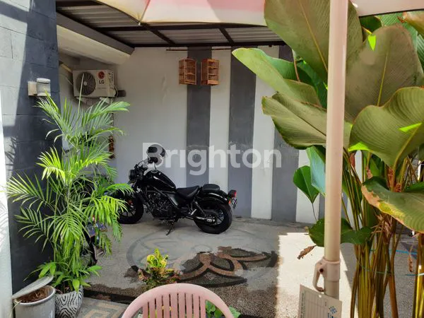 image RUMAH DENGAN TAMAN TERBUKA DI PURIMAS SURABAYA DEKAT UPN DAN MERR (8)