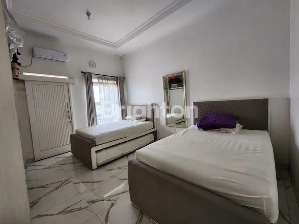 image HUNIAN ASRI DAN NYAMAN 2 LANTAI SEMI FURNISH DI LOKASI STRATEGIS SENTUL (5)