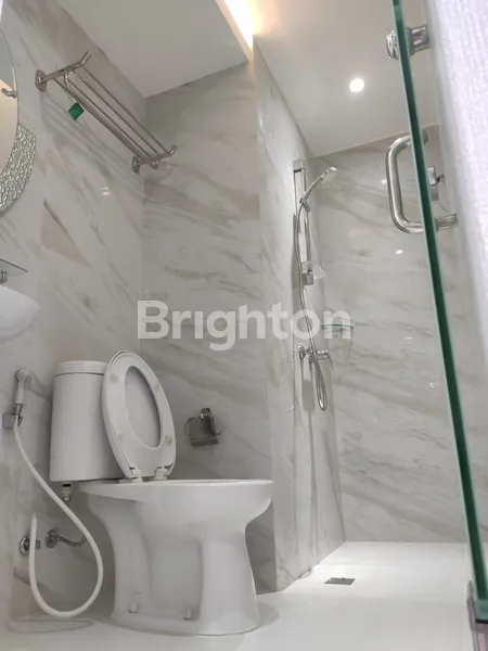 image SEWA UNIT APARTEMEN TERAWAT 2BR DI PUNCAK DHARMAHUSADA SURABAYA. (8)