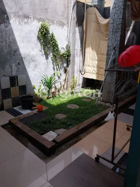 image RUMAH SIAP HUNI DENGAN LINGKUNGAN ASRI DI DUKUH BIMA BEKASI (7)