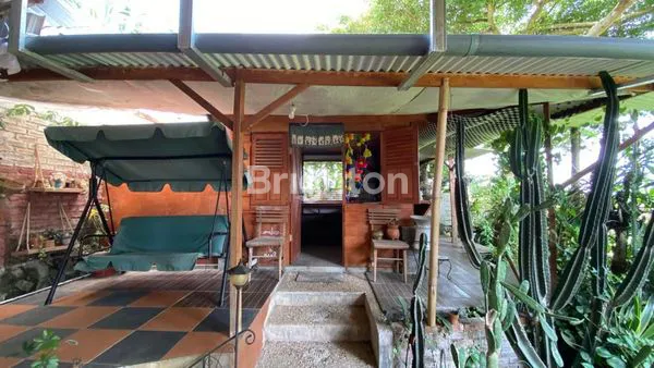 image VILLA ETNIC DI BELAKANG SETIABUDI REGENCY HALAMAN LUAS DAN KEBUN SAYURAN (3)