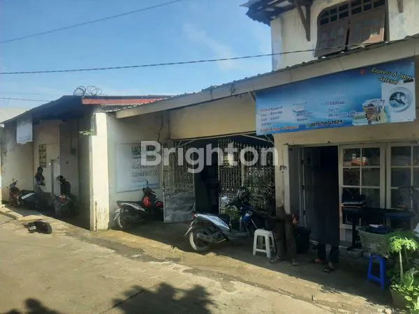 image RUMAH DAN GUDANG LAYAK HUNI DIPINGGIR JALAN DEPOK TENGAH (1)