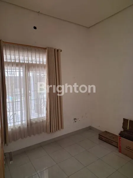 image RUMAH MINIMALIS DI PERUMAHAN CLUSTER COLOMADU (3)