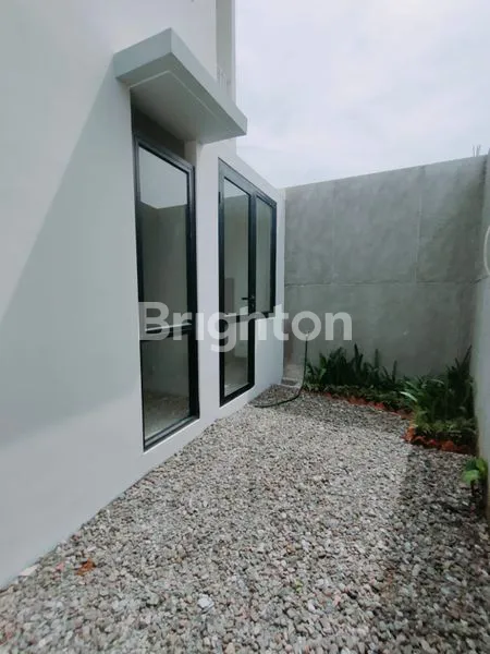 image RUMAH 2 LANTAI DALAM CLUSTER DEKAT STASIUN DEPOK (1)