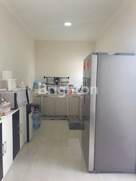 image DIJUAL RUMAH CANTIK DI PERUMAHAN SUVARNA SUTERA SARI  (5)