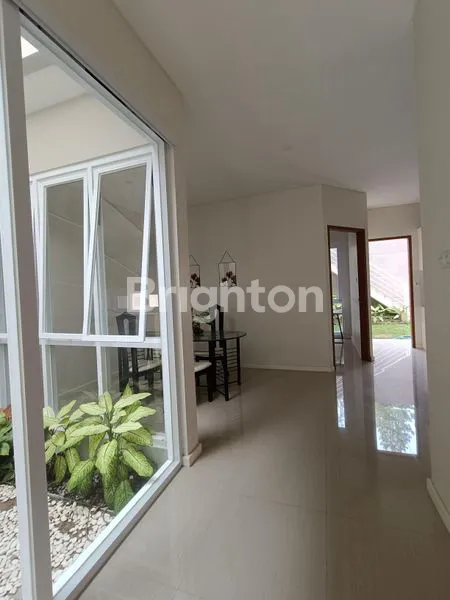 image RUMAH BARU STYLE MINIMALIS  MODERN DI SAYAP TUBAGUS ISMAIL (7)