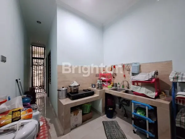 image RUMAH MINIMALLIST TERAWAT DUA LANTAI LINGKUNGAN PERUMAHAN DI RENON (3)