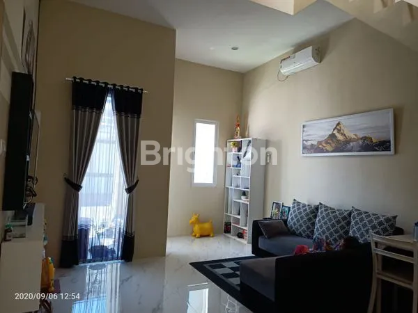 image RUMAH MINIMALIS DENGAN BALKON DEPAN DI EVERGREEN SURABAYA TIMUR  (3)
