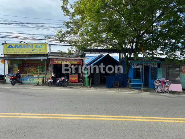 image TANAH BESERTA KIOS DAN BANGUNAN DI KILO 2,5 (1)