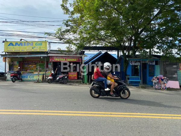 image TANAH BESERTA KIOS DAN BANGUNAN DI KILO 2,5 (2)