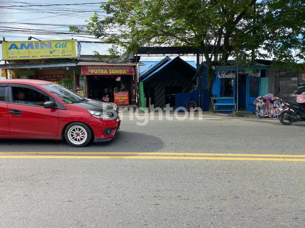 image TANAH BESERTA KIOS DAN BANGUNAN DI KILO 2,5 (4)