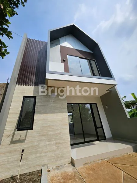 image RUMAH KEREN DESAIN MODERN DI CLUSTER PONDOK CABE (1)