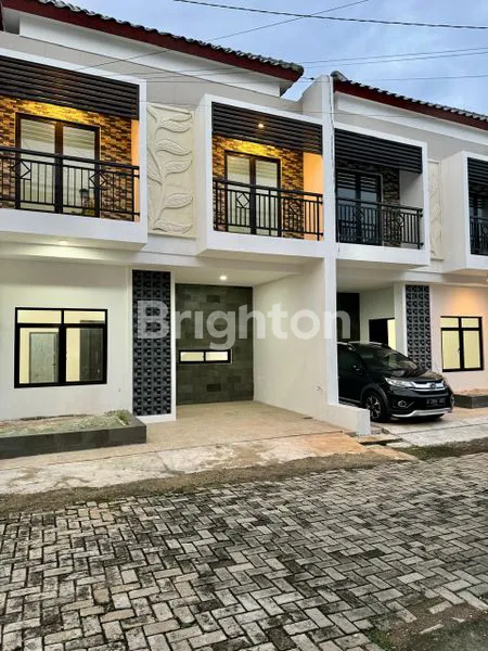 image RUMAH BARU TROPIS MODERN CLUSTER BARU DI PANGKALAN JATI (1)