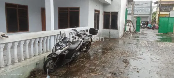 image BANGUNAN TENGAH KOTA NOL JALAN (1)